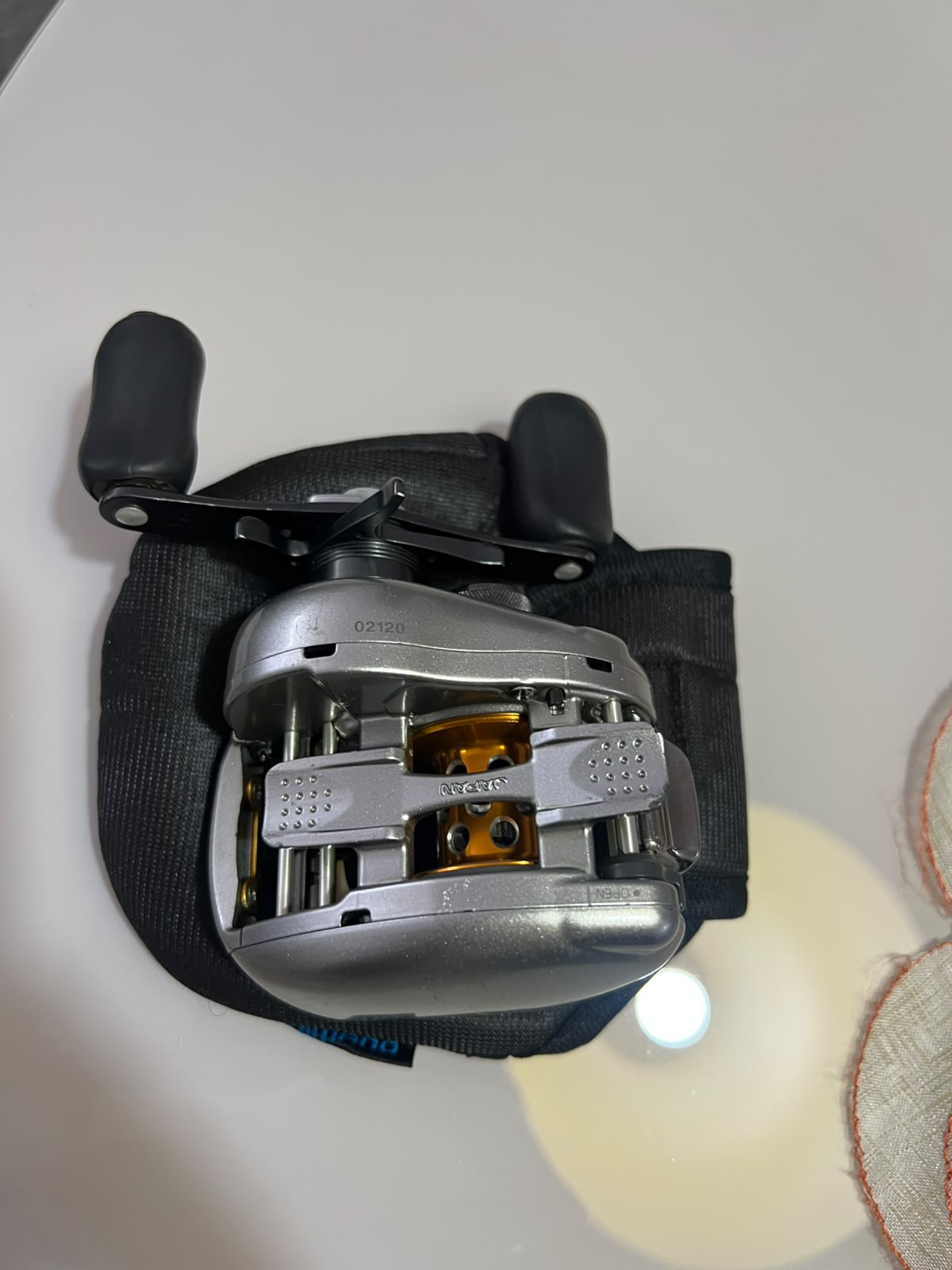 Carretinha Shimano Mettanium MG7 Esquerda