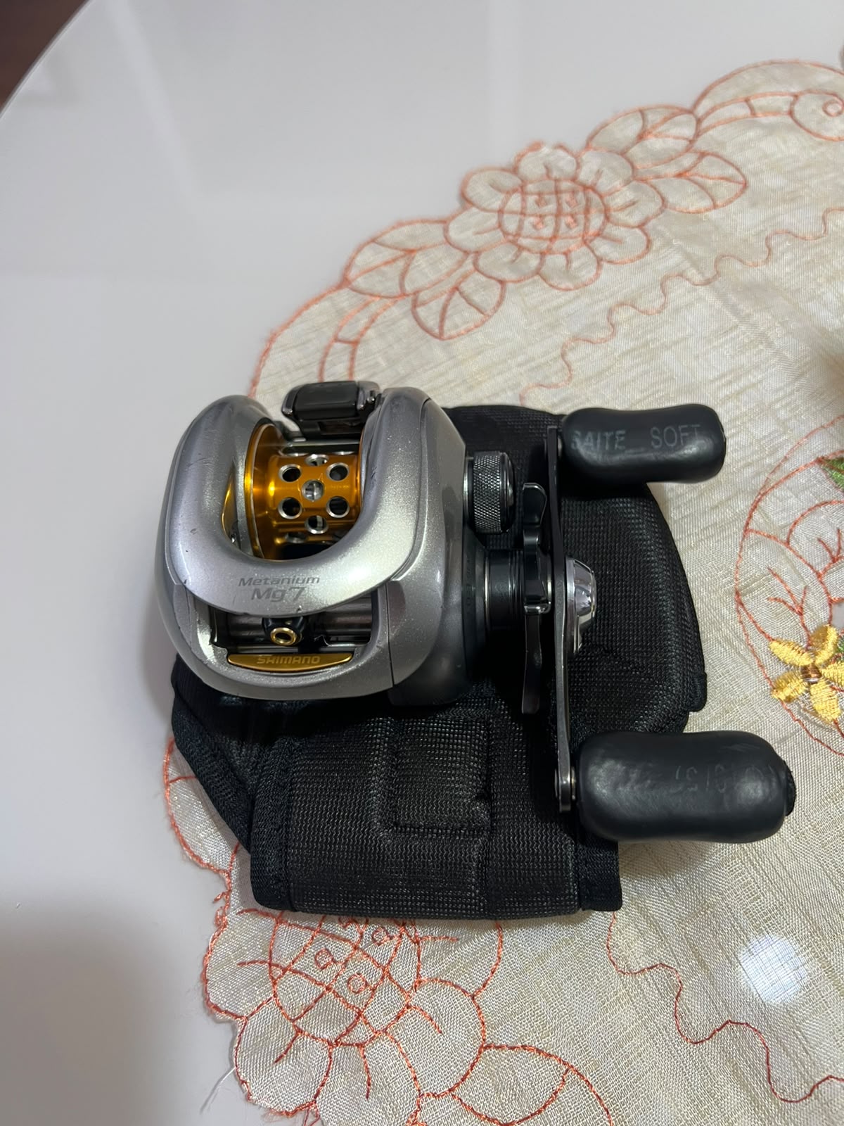 Carretinha Shimano Mettanium MG7 Esquerda